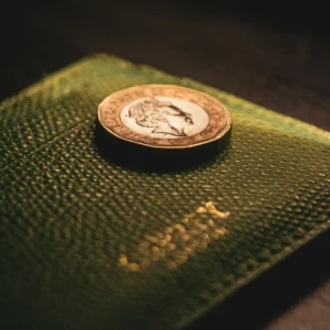 UK coin on bloack wallter on a black background