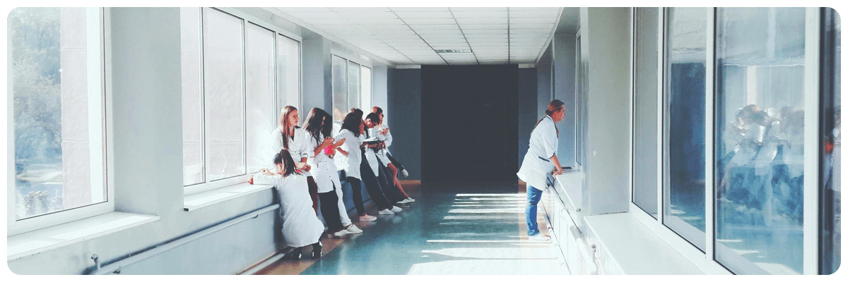 Healthcare workers enjoying the spring sunshine while they wait