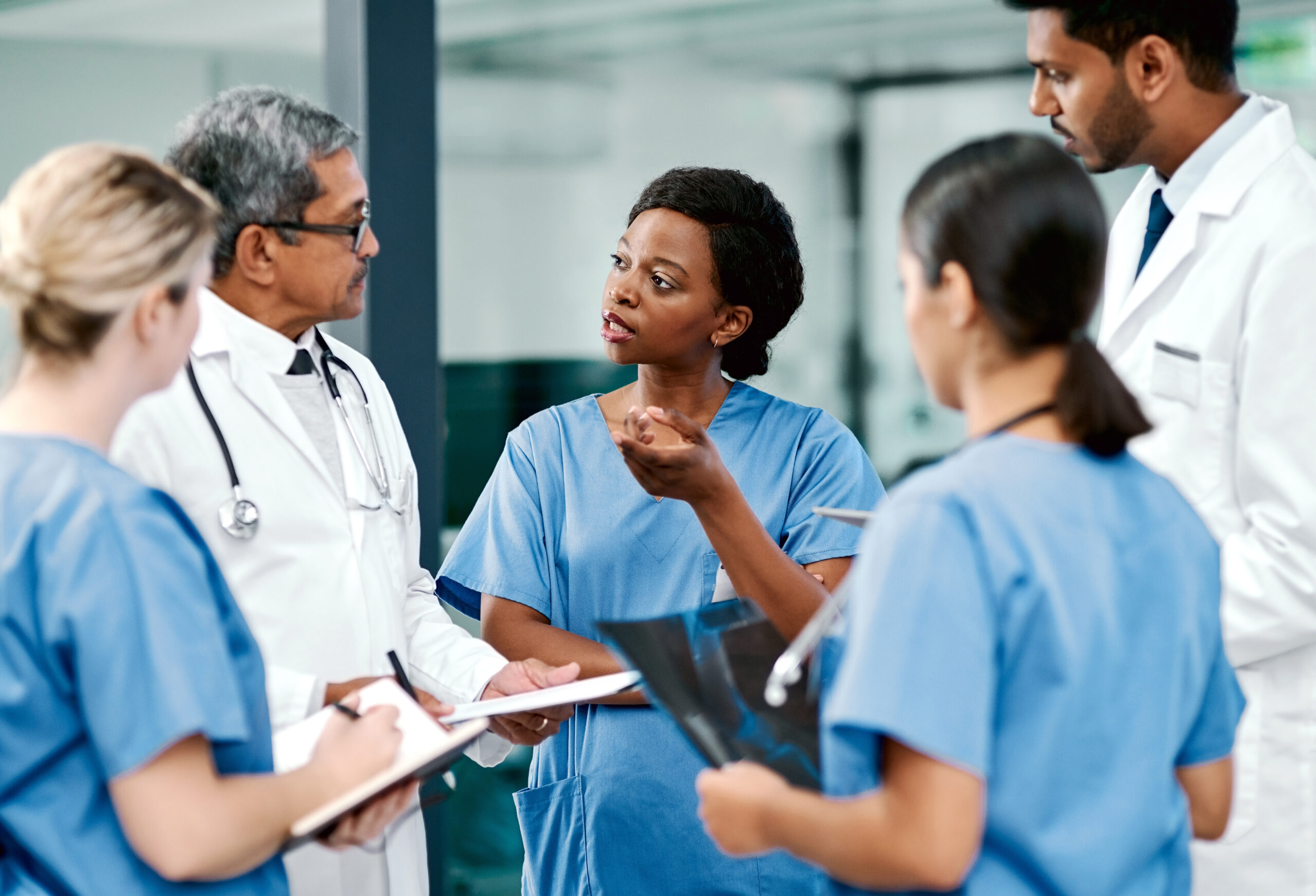 A group of healthcare workers having a discussion